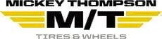Logo of Mickey Thompson Tires & Wheels in bold black text, featuring M/T with yellow wings on either side, representing its reputation among top tire brands near me. Superior Tire: Tire Shop and Auto Repair Near Me | Barrie | Danforth | Downsview | Markham | Mississauga | Oak Ridges | Scarborough | Thornhill | Toronto | https://superiortire.ca/