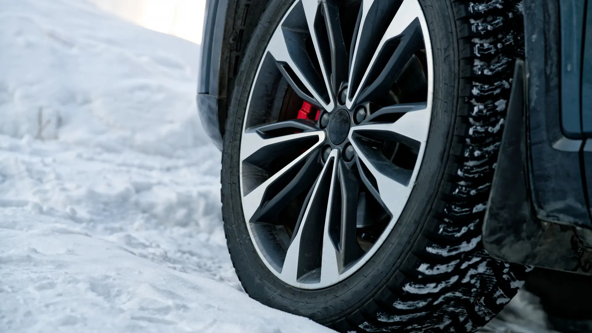 AWD SUV with winter tires on a snowy Ontario road